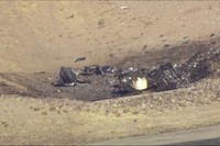 plane debris seen from above at Marana Regional Airport after a deadly crash in Marana, Ariz.