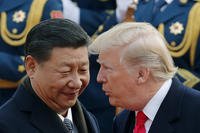 U.S. President Donald Trump, right, chats with Chinese President Xi Jinping