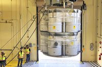 barrels of radioactive waste are loaded for transport to the Waste Isolation Pilot Plant
