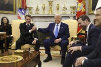 France's President Emmanuel Macron speaks with President Trump