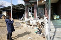 Local resident Park Sung-sook reacts at her damaged house near a bomb accident site in Pocheon, South Korea.