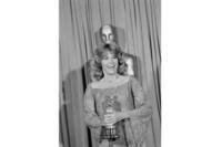 Jane Fonda poses with her Oscar at the 1978 Academy Awards on April 9, 1979, in Los Angeles. Fonda won the best actress award for her role in &quot;Coming Home.&quot;