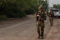 South Carolina Army National Guard soldiers, assigned to 132nd Military Police Company, 168th Military Police Battalion, 90th Sustainment Brigade, Task Force Tough Hombres, conduct foot patrols along the southern border near Rio Grande City, Texas.