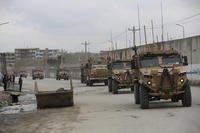 In this file photo dated March 25, 2020, British troops with NATO-led Resolute Support Mission forces travel through Kabul, Afghanistan. (AP Photo/Rahmat Gul)