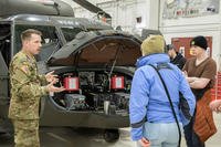UH-60 Blackhawk crew chief speaks with high school students