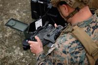 U.S. Marine first-person-view attack drone operator flies a Skydio X2D drone