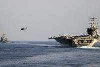 USS Dwight D. Eisenhower crosses the Strait of Hormuz into the Persian Gulf