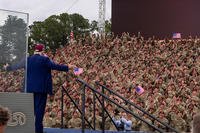 President Donald Trump greets troops at at Fort Bragg