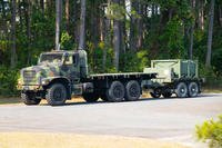 A U.S. Marine Corps 7-ton pulls fresh drinking water during Exercise STRATMOBEX at Marine Corps Air Station Beaufort.