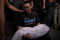 Abdel Hadi Bashir mourns the loss of his two daughters, Sabah and Mira who were killed in an Israeli army airstrike
