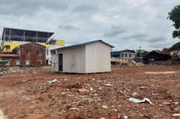 A temporary building is seen after clear collapsed building caused by strong earthquake in Naypyitaw, Myanmar