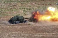 Russian T-80BVM tank fires towards Ukrainian positions