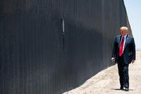 U.S. President Donald Trump participates in a ceremony commemorating the 200th mile of border wall at the international border with Mexico in San Luis, Arizona.