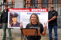 Sarande Jackson speaks in front of the Massachusetts State House on Sept. 18, 2025, about her fiancée, Kyle Culotta, who was arrested and jailed on gun charges.