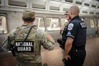 U.S. soldiers with the West Virginia National Guard conduct a routine patrol at the Stadium-Armory Metro Station in Washington, D.C.
