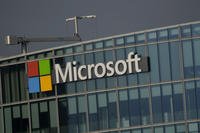 The logo of Microsoft is seen outside its French headquarters in Issy-les-Moulineaux, outside Paris