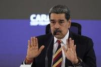 President Nicolas Maduro gives a press conference in Caracas, Venezuela