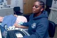 A sailor administers an ultrasound.