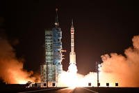 A long March-2F carrier rocket carrying the Shenzhou-19 spacecraft and crew of three astronauts lifts off from the Jiuquan Satellite Launch Center, in the Gobi desert, northwest China