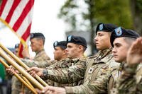 The 101st Airborne Division (Air Assault) color guard presents the colors during the official ceremony of the 78th year commemoration of Operation Market Garden at Sint-Oedenrode, Netherlands, Sept. 18, 2022. (U.S. Army photo by Capt. Angelo Mejia)