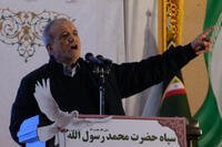Iranian President Masoud Pezeshkian speaks during a ceremony commemorating the death anniversary of the late commander of the Iran's Revolutionary Guard expeditionary Quds Force, Gen. Qassem Soleimani, who was killed in a U.S. drone attack in 2020 in Iraq, at the Imam Khomeini grand mosque in Tehran, Iran, Thursday, Jan. 1, 2026. (AP Photo/Vahid Salemi)