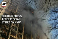 Building Burns After Russian Strike on Kyiv