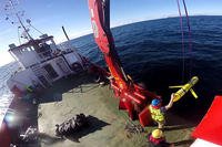 Crew members aboard the VOS Raasay recover U.S. and British Royal Navy ocean gliders Oct. 8, 2016. A similar unmanned underwater vehicle was seized by the Chinese Navy in international waters Dec. 15. Cmdr. Santiago Carrizosa/Navy