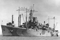 USS Ancon (AGC-4) at anchor in Manila Bay, Philippine Islands in August 1945, She is wearing Measure 31a, Design 18Ax camouflage and has a large hull number painted on her bow. (Photo: U.S. Navy)