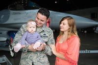 .S Air Force Staff Sgt. John Dunlap, his wife Jennifer and baby daughter Evelyn