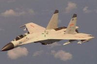 A Chinese fighter jet made several “dangerous” passes near a Navy P-8A Poseidon