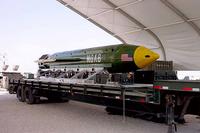 The GBU-43/B Massive Ordnance Air Blast bomb sits at an air base in Southwest Asia. The MOAB is also called "The Mother of all Bombs" by scientists and the community alike. (Air Force photo)
