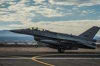 Lt. Col. Julian Pacheco and Iraqi air force captain Hama land one of the IAF's F-16 Fighting Falcon aircraft Dec. 16, 2014, at the Tucson International Airport, Ariz. (U.S. Air Force photo/Senior Airman Jordan Castelan)