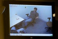 Prosecutors play the tape of the police interview with former Marine Cpl. Eddie Ray Routh at his capital murder trial at the Erath County, Donald R. Jones Justice Center in Texas, Monday, Feb. 16, 2015. (AP Photo/Star-Telegram, Rodger Mallison)