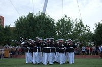 The United States Marine Corps Silent Drill Platoon preforms a series of rifle maneuvers at Civic Space Park, Phoenix, Sept. 9, 2015, as part of the opening ceremony for Marine Week Phoenix. (Photo: Sgt. Cuong Le)