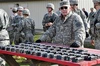 Army Sgt. 1st Class Harold G. Tackett prepares to issue ammunition during the German Armed Forces Badge for Military Proficiency competition held at Camp Dodge, Johnston, Iowa. (Iowa National Guard/Army Master Sgt. Duff E. McFadden)