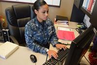 Aviation Boatswain's Mate (Handling) 2nd Class Britani Parker, assigned to the air operations department at Naval Station Norfolk, completes administrative tasks.