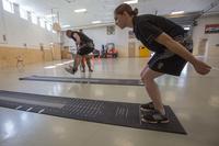 Missouri National Guard recruits participate in the standing long jump, one of four events included in the Occupational Physical Assesment Test, in Jefferson City on August 16, 2016. (U.S. Army/Cpl. Samantha J. Whitehead)
