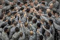 Airmen group huddle at the conclusion of the Police Week Memorial 5K Ruck March at Yokota Air Base, Japan, May 15, 2017. (Air Force photo/Donald Hudson)