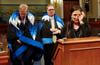 Rep. Deb Haaland, Rep. Denny Heck, and Rep. Paul Cook during a news conference.