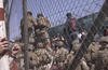 U.S. Marines are at Abbey Gate before a suicide bomber struck outside Hamid Karzai International Airport on Aug. 26, 2021, in Kabul, Afghanistan.