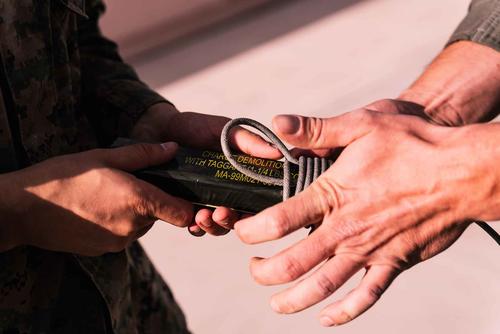 C-4 explosive is wrapped with detonation cord.