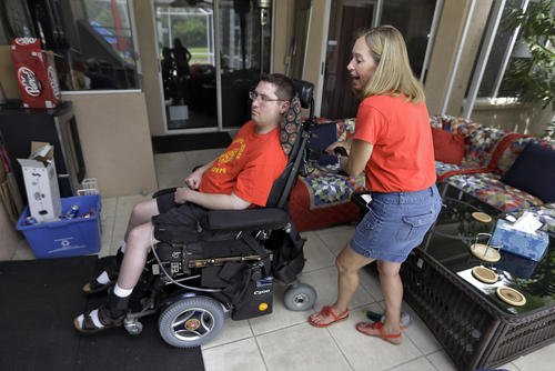 Caregiver Chris Ott and her son, former Marine John Thomas Doody