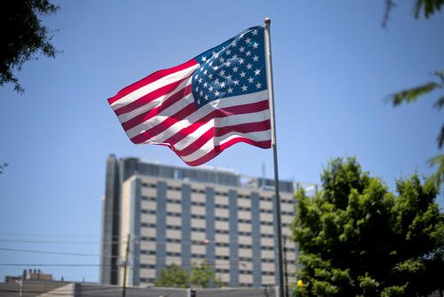 American flag flies in front of the Atlanta VA Medical Center in Atlanta.