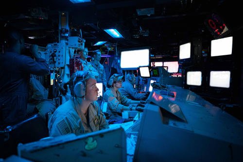 Sailors assigned to the Arleigh Burke-class guided-missile destroyer USS Carney (DDG 64) stand watch