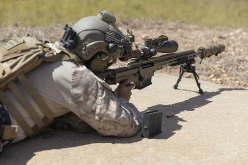 U.S. Marine Corps Cpl. Andrew Lam fires an MK 22 bolt-action sniper rifle during a battlesight zero range at Mount Bundey Training Area, NT, Australia, May 1, 2024.