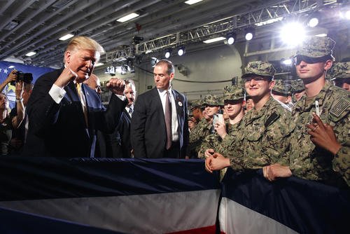 Pres. Trump greets troops after speaking aboard the USS Wasp in Yokosuka, Japan