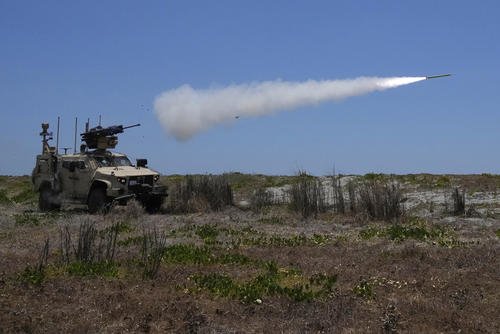 A U.S. Marine Air Defense Integrated System fires at a drone.