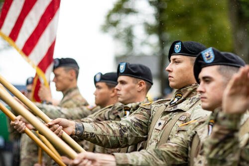The 101st Airborne Division (Air Assault) color guard presents the colors during the official ceremony of the 78th year commemoration of Operation Market Garden at Sint-Oedenrode, Netherlands, Sept. 18, 2022. (U.S. Army photo by Capt. Angelo Mejia)