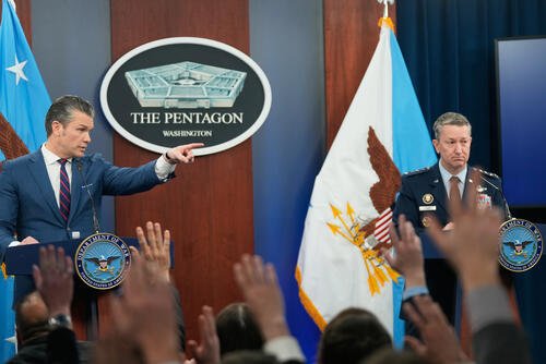 Defense Secretary Pete Hegseth and Chairman of the Joint Chiefs of Staff Gen. Dan Caine take questions during a press briefing at the Pentagon, Monday, March 2, 2026, in Washington. (AP Photo/Mark Schiefelbein)
